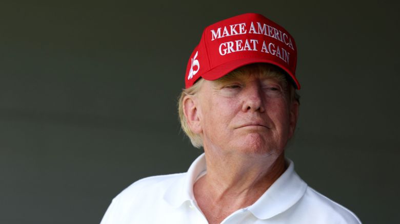 STERLING, VIRGINIA - MAY 26: Former US President Donald Trump watches from a box on the 18th green during day one of the LIV Golf Invitational - DC at Trump National Golf Club on May 26, 2023 in Sterling, Virginia. (Photo by Rob Carr/Getty Images)