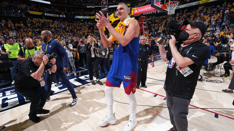 DENVER, CO - JUNE 1: Nikola Jokic #15 of the Denver Nuggets celebrates and walks off the court after Game One of the 2023 NBA Finals against the Miami Heat on June 1, 2023 at the Ball Arena in Denver, Colorado. NOTE TO USER: User expressly acknowledges and agrees that, by downloading and/or using this Photograph, user is consenting to the terms and conditions of the Getty Images License Agreement. Mandatory Copyright Notice: Copyright 2023 NBAE (Photo by Garrett Ellwood/NBAE via Getty Images)