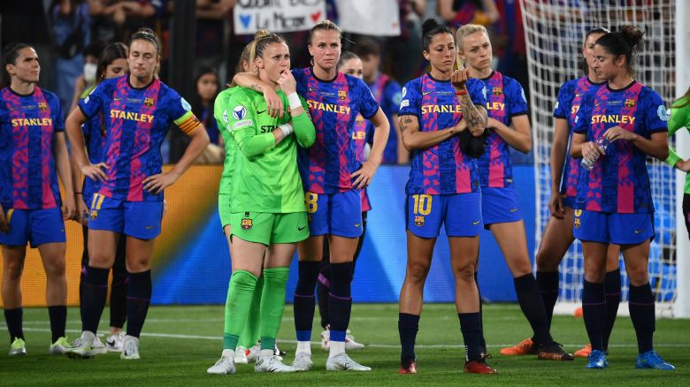 Barcelona's players react after their defeat in the UEFA Womens Champions League Final football match between Spain's Barcelona and France's Lyon at the Allianz Stadium in the Italian city of Turin on May 21, 2022. 