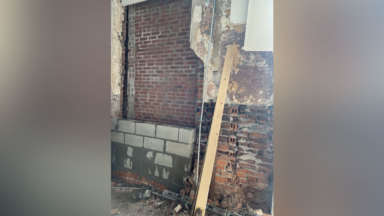 City inspectors said brick work had started on the building by May 25, but repair permit notes don't explicity mention whether work on the wall of concern had started. 