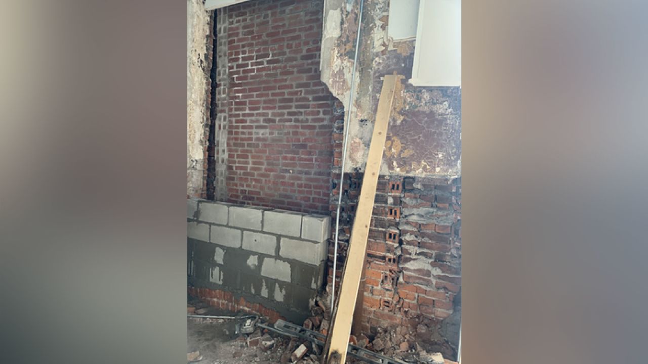 City inspectors said brick work had started on the building by May 25, but repair permit notes don't explicity mention whether work on the wall of concern had started.