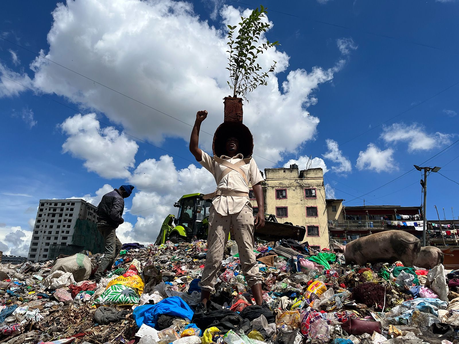 Congolese artists wear costumes made of trash to shine a light on  Kinshasa's pollution problem