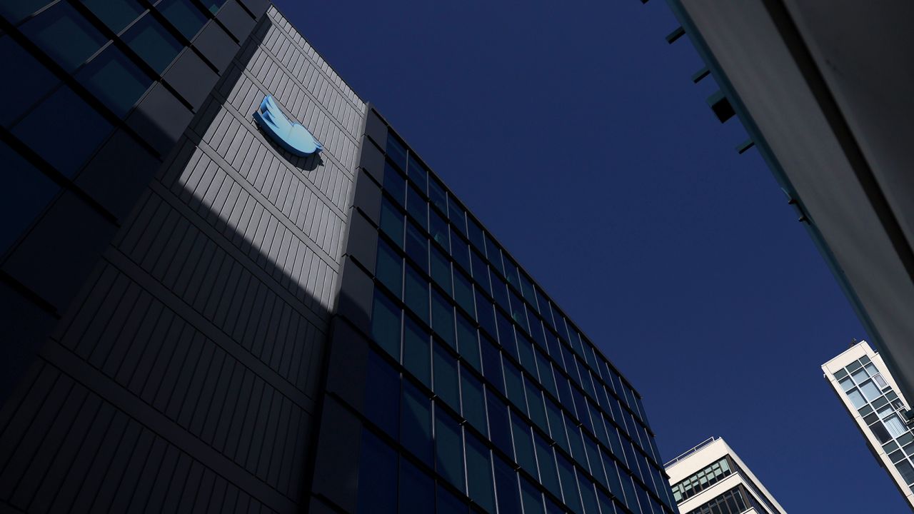 The Twitter logo is displayed on the exterior of Twitter headquarters in San Francisco.