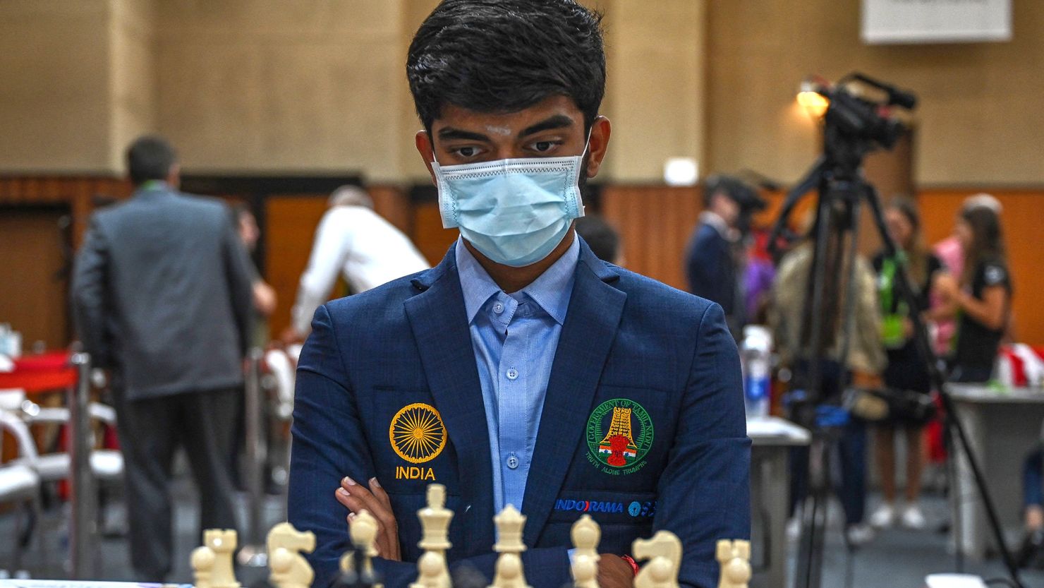 Gukesh surveys the board during his round nine game against the Azerbaijan team at the 44th Chess Olympiad on August 7, 2022.