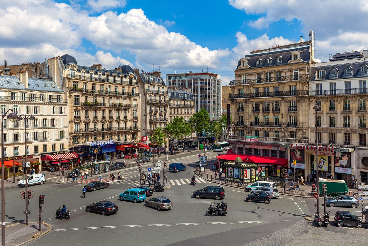 HRD20C PARIS, FRANCE - MAY 25, 2016:  View of typical parisian building and boulevard du Montparnasse in Paris - capital and most populous city of France, on