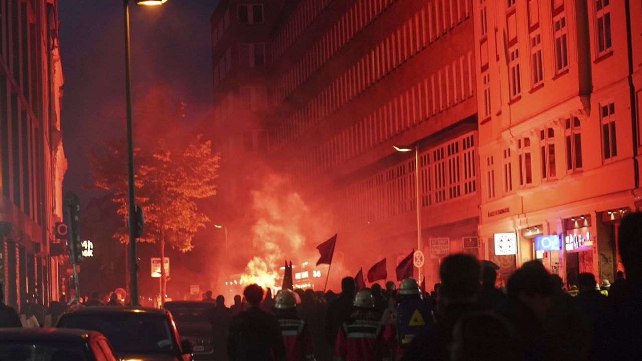 Protesters burned flares after Lina E.'s sentencing.