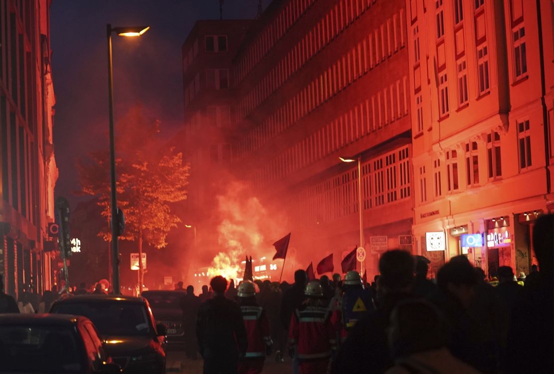 Protesters burned flares after Lina E.'s sentencing.