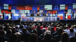 Guests watch Republican presidential candidates speak during the first Republican presidential debate hosted by Fox News and Facebook at the Quicken Loans Arena on August 6, 2015 in Cleveland, Ohio.