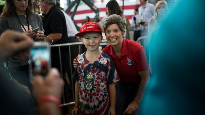 Sen. Joni Ernst takes a picture with Mason Haliburton at the 2nd annual Joni Ernst Roast and Ride event on August 27, 2016 in Des Moines, Iowa.