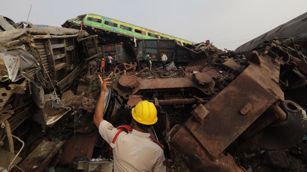 An official overseas rescue efforts at the site of the train crash in Balasore.