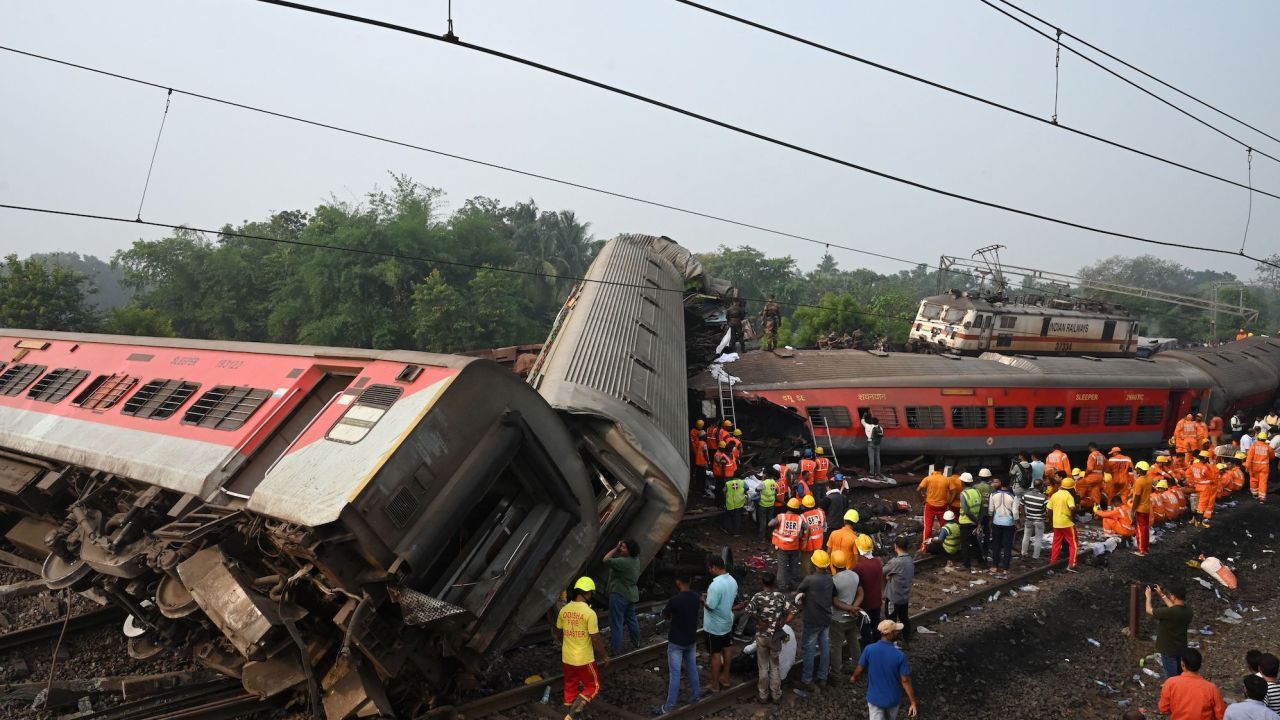 Rescue workers search through the wreckage.