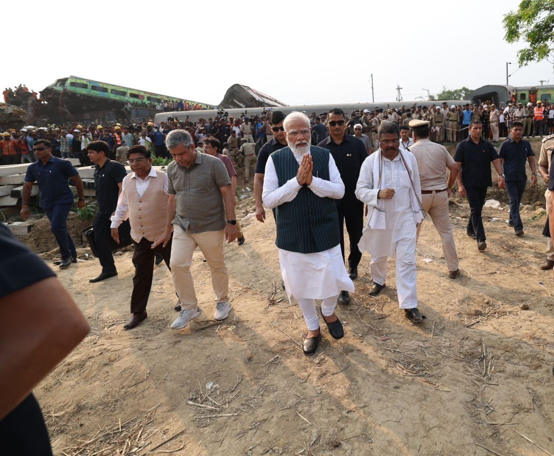 Indian Prime Minister Narendra Modi is seen visiting the crash site on Saturday.