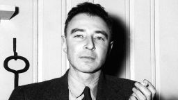 Julius Robert Oppenheimer(April 22, 1904 Ð February 18, 1967) was an American theoretical physicist and professor of physics at the University of California, Berkeley. He is among the persons who are often called the 'father of the atomic bomb' for their role in the Manhattan Project, the World War II project that developed the first nuclear weapons. The first atomic bomb was detonated on July 16, 1945, in the Trinity test in New Mexico; Oppenheimer remarked later that it brought to mind words from the Bhagavad Gita: 'Now I am become Death, the destroyer of worlds'. After the war he became a chief advisor to the newly created United States Atomic Energy Commission and used that position to lobby for international control of nuclear power to avert nuclear proliferation and an arms race with the Soviet Union. After provoking the ire of many politicians with his outspoken opinions during the Second Red Scare, he had his security clearance revoked in a much-publicized hearing in 1954, and was effectively stripped of his direct political influence; he continued to lecture, write and work in physics. Nine years later President John F. Kennedy awarded (and Lyndon B. Johnson presented) him with the Enrico Fermi Award as a gesture of political rehabilitation. (Photo by: Pictures From History/Universal Images Group via Getty Images)
