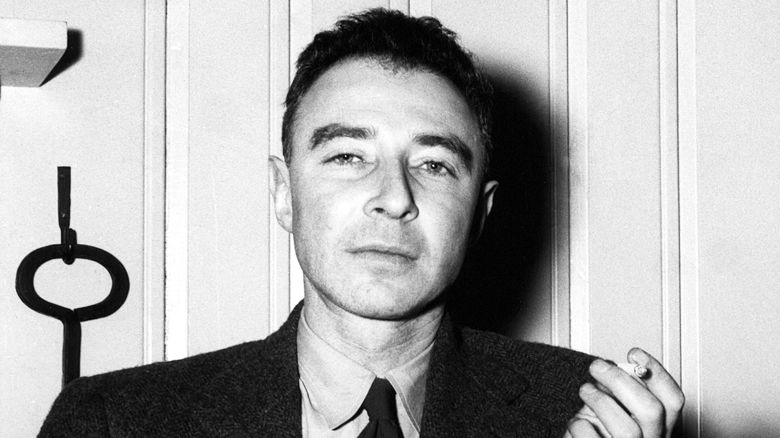 Julius Robert Oppenheimer(April 22, 1904 Ð February 18, 1967) was an American theoretical physicist and professor of physics at the University of California, Berkeley. He is among the persons who are often called the 'father of the atomic bomb' for their role in the Manhattan Project, the World War II project that developed the first nuclear weapons. The first atomic bomb was detonated on July 16, 1945, in the Trinity test in New Mexico; Oppenheimer remarked later that it brought to mind words from the Bhagavad Gita: 'Now I am become Death, the destroyer of worlds'. After the war he became a chief advisor to the newly created United States Atomic Energy Commission and used that position to lobby for international control of nuclear power to avert nuclear proliferation and an arms race with the Soviet Union. After provoking the ire of many politicians with his outspoken opinions during the Second Red Scare, he had his security clearance revoked in a much-publicized hearing in 1954, and was effectively stripped of his direct political influence; he continued to lecture, write and work in physics. Nine years later President John F. Kennedy awarded (and Lyndon B. Johnson presented) him with the Enrico Fermi Award as a gesture of political rehabilitation. (Photo by: Pictures From History/Universal Images Group via Getty Images)