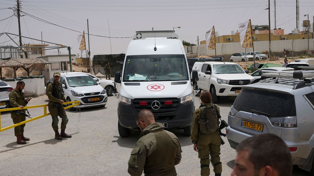 An ambulance leaves a military base following a deadly shootout in southern Israel along the Egyptian border on June 3, 2023.