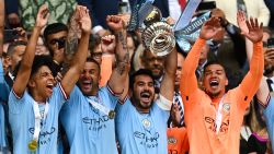 LONDON, ENGLAND - JUNE 03: Ilkay Gundogan of Manchester City lifys the trophy at the end of the Emirates FA Cup Final between Manchester City and Manchester United at Wembley Stadium on June 03, 2023 in London, England. (Photo by Mike Hewitt/Getty Images)