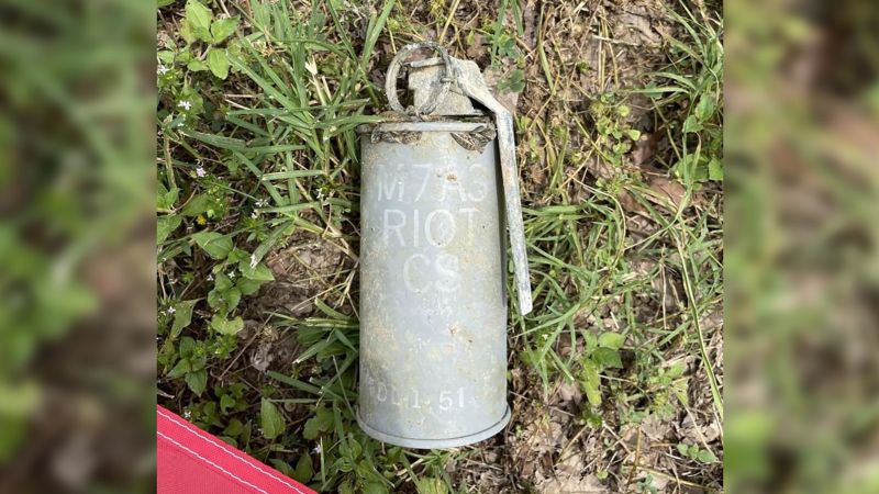 NextImg:Scuba diver finds live tear gas grenade while exploring Oklahoma lake | CNN