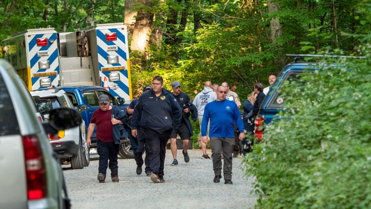 Search and rescue teams leave the command post at St. Mary's Wilderness en route to the Blue Ridge Parkway to search for the site where a Cessna Citation crashed over mountainous terrain near Montebello, Va., Sunday, June 4, 2023. (Randall K. Wolf via AP)