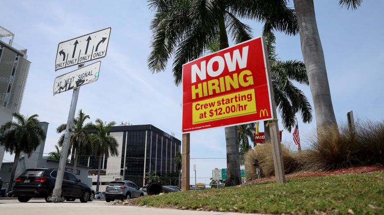 MIAMI, FLORIDA - MAY 05: A 'Now Hiring' sign posted outside of a restaurant looking to hire workers on May 05, 2023 in Miami, Florida. A report by the Bureau of Labor Statistics showed the US economy added 253,000 jobs in April.  (Photo by Joe Raedle/Getty Images)
