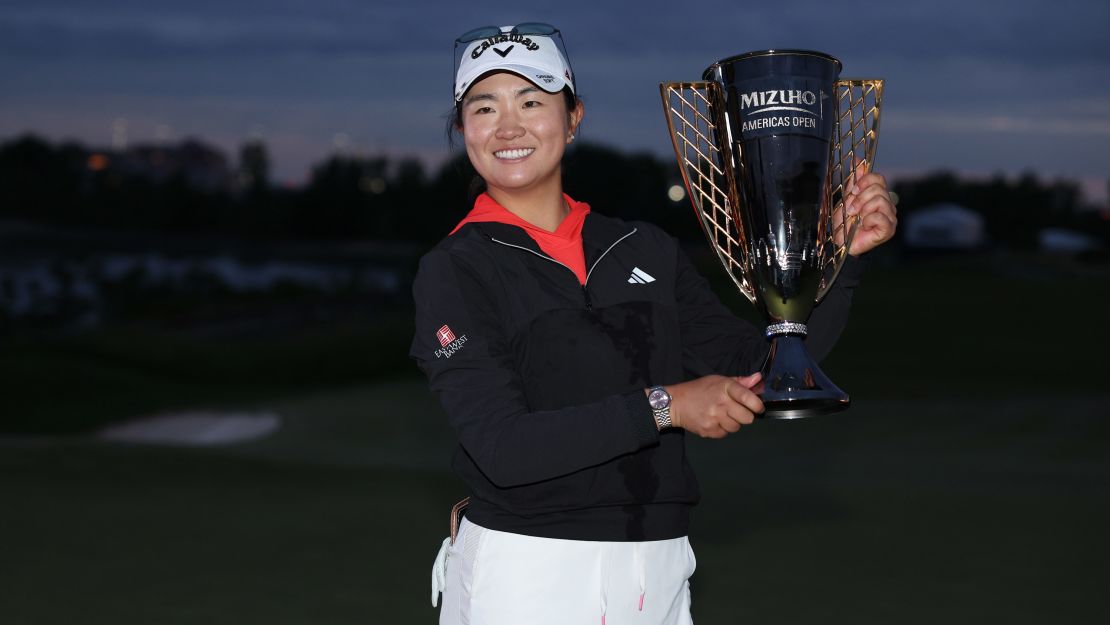 JERSEY CITY, NEW JERSEY - JUNE 04: Rose Zhang of the United States poses with the trophy after winning the Mizuho Americas Open in a playoff over Jennifer Kupcho of the United States (not pictured) during the final round at Liberty National Golf Club on June 4, 2023 in Jersey City, New Jersey. (Photo by Elsa/Getty Images)