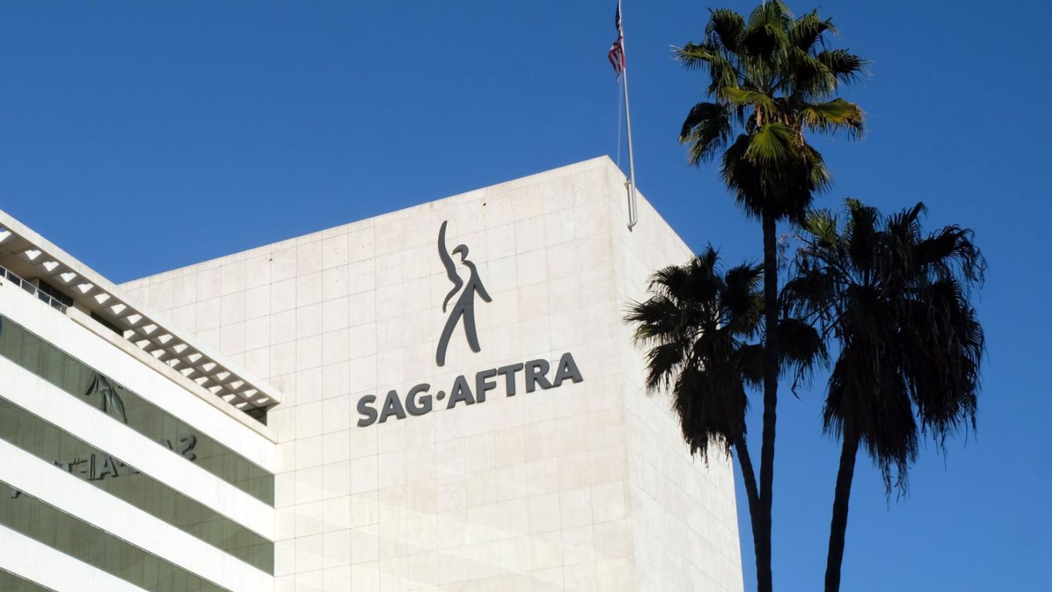 The SAG-AFTRA headquarters building in Los Angeles. The union representing 160,000 actors is delaying a strike deadline against major studios and streaming services.