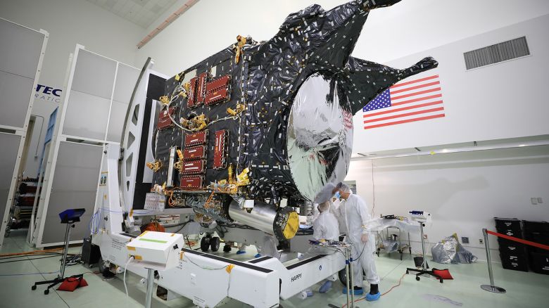 A team prepares NASA's Psyche spacecraft for launch inside the Astrotech Space Operations Facility near the agency's Kennedy Space Center in Florida on Dec. 8, 2022. Psyche will launch atop a SpaceX Falcon Heavy rocket from Launch Complex 39A at Kennedy. Launch is targeted for no earlier than Oct. 10, 2023. The spacecraft will use solar-electric propulsion to travel approximately 1.5 billion miles to rendezvous with its namesake asteroid in 2026. The Psyche mission is led by Arizona State University. NASA's Jet Propulsion Laboratory, which is managed for the agency by Caltech in Pasadena, California, is responsible for the mission's overall management, system engineering, integration and testing, and mission operations. Maxar Technologies in Palo Alto, California, provided the high-power solar electric propulsion spacecraft chassis. NASA's Launch Services Program (LSP), based at Kennedy, is managing the launch.