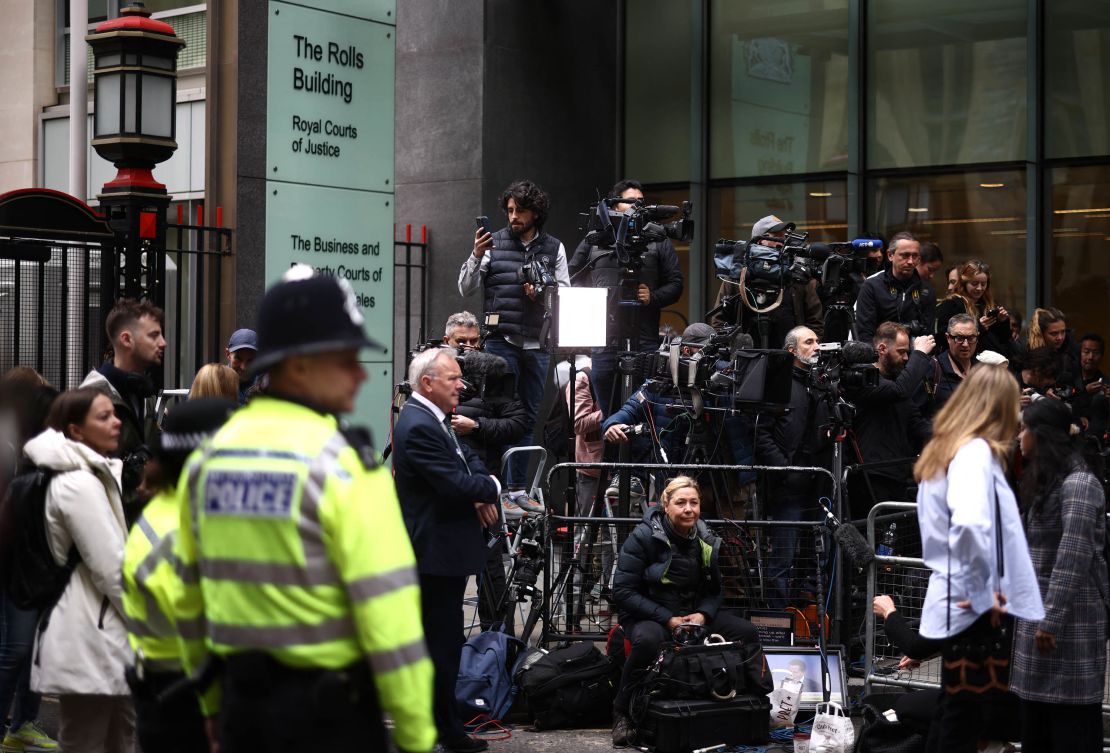 There was a throng of media outside the court on Tuesday.