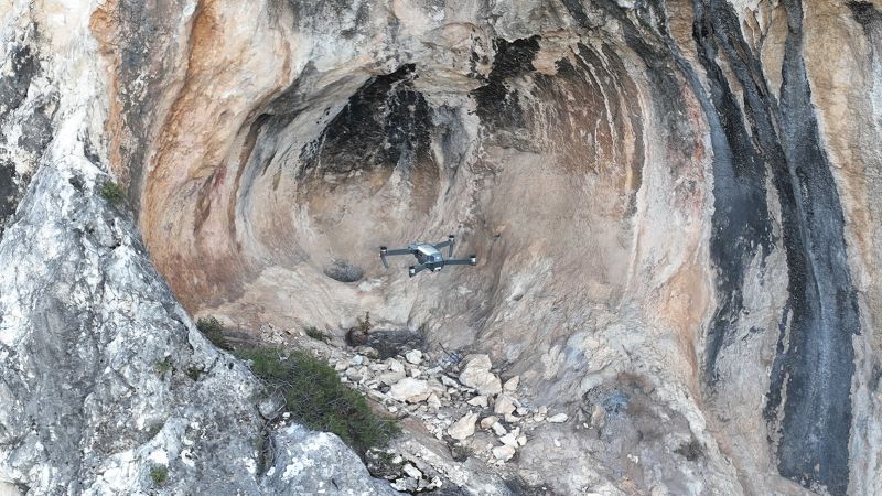 NextImg:Prehistoric cave paintings discovered in Spain using drones | CNN