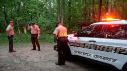 Authorities secure the entrance to Mine Bank Trail, an access point to the rescue operation along the Blue Ridge Parkway where a Cessna Citation crashed over mountainous terrain near Montebello, Va., Sunday, June 4, 2023. 