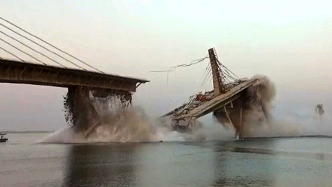 This photo taken on June 4, 2023, shows an under construction bridge collapsing into the river Ganges in Bhagalpur district in India's eastern state of Bihar. 