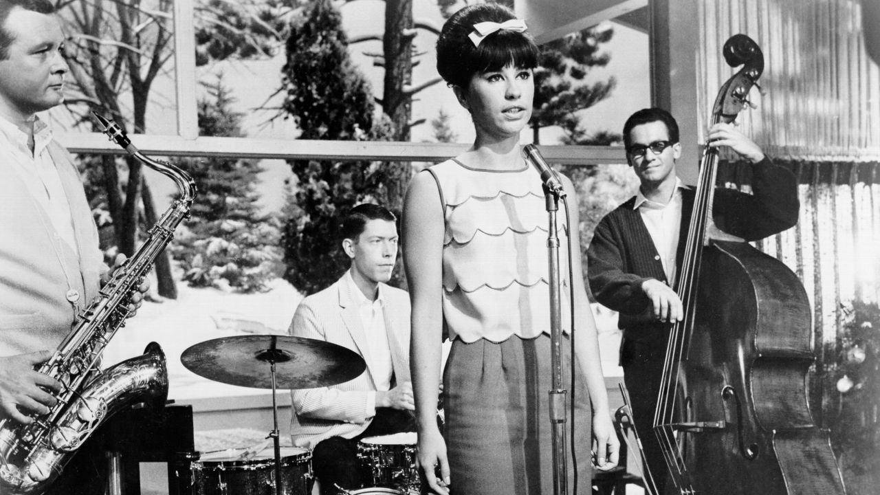 Stan Getz (left) and Astrud Gilberto in a scene from the film "Get Yourself A College Girl," 1964.  