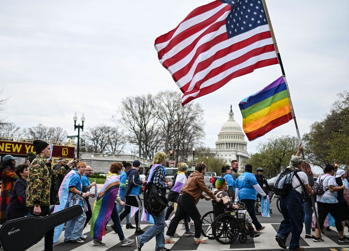 Supporters of LGBTQA+ rights march on March 31 from Union Station toward Capitol Hill in Washington, DC.