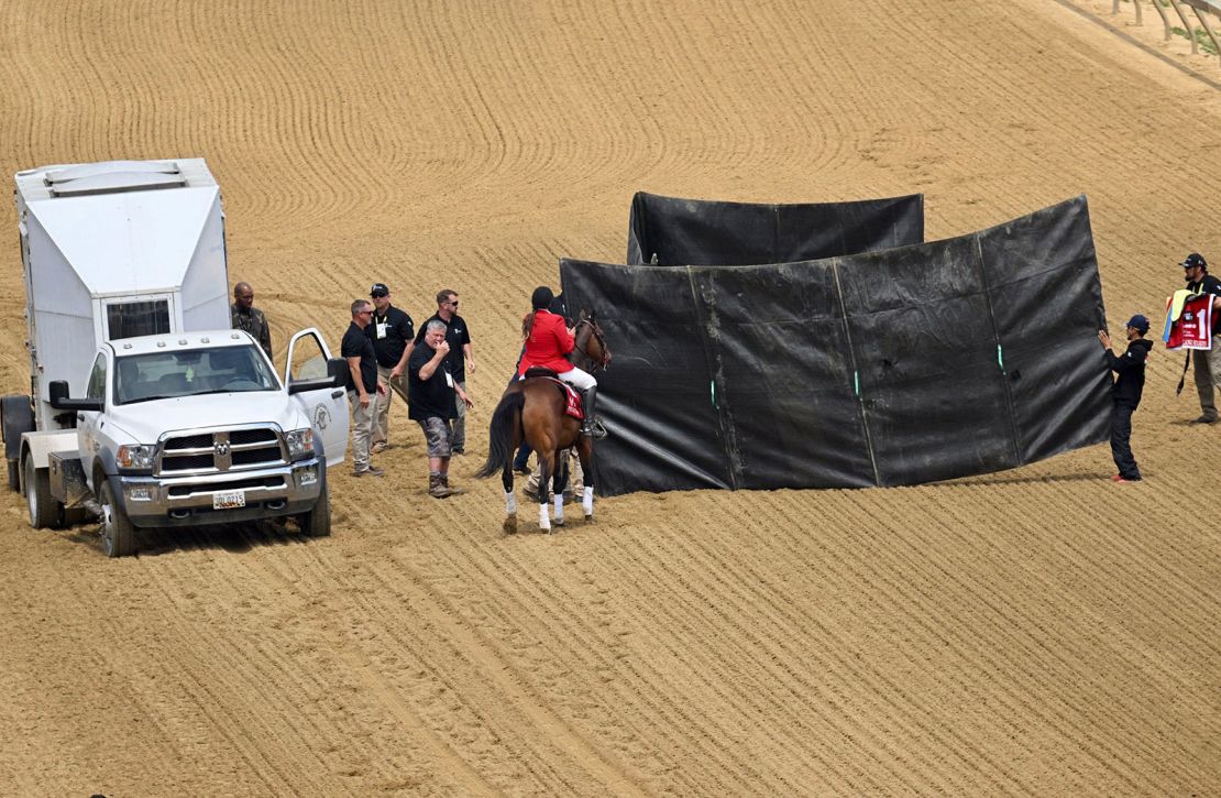 Bob Baffert-trained horse Havnameltdown, behind the curtain, had to be euthanized on May 20, 2023, during the sixth race of Preakness Day in Baltimore. 