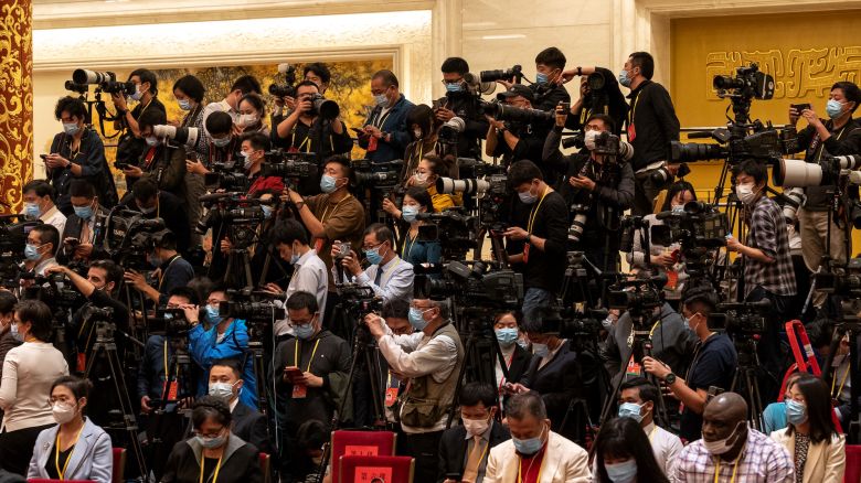 Members of the media wait ahead of the unveiling of the Communist Party of China's new Politburo Standing Committee at the Great Hall of the People in Beijing, China, on Sunday, Oct. 23, 2022. President Xi Jinping stacked China's most powerful body with his allies, giving him unfettered control over the world's second-largest economy. Source: Bloomberg