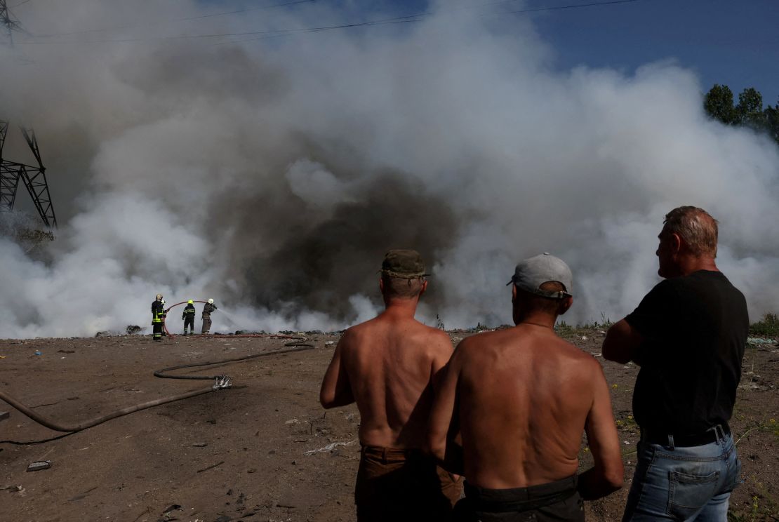 Firefighters attempt to put out a fire allegedly caused by shelling in the Nemyshlianski district in Kharkiv region, Ukraine, on June 20, 2022.