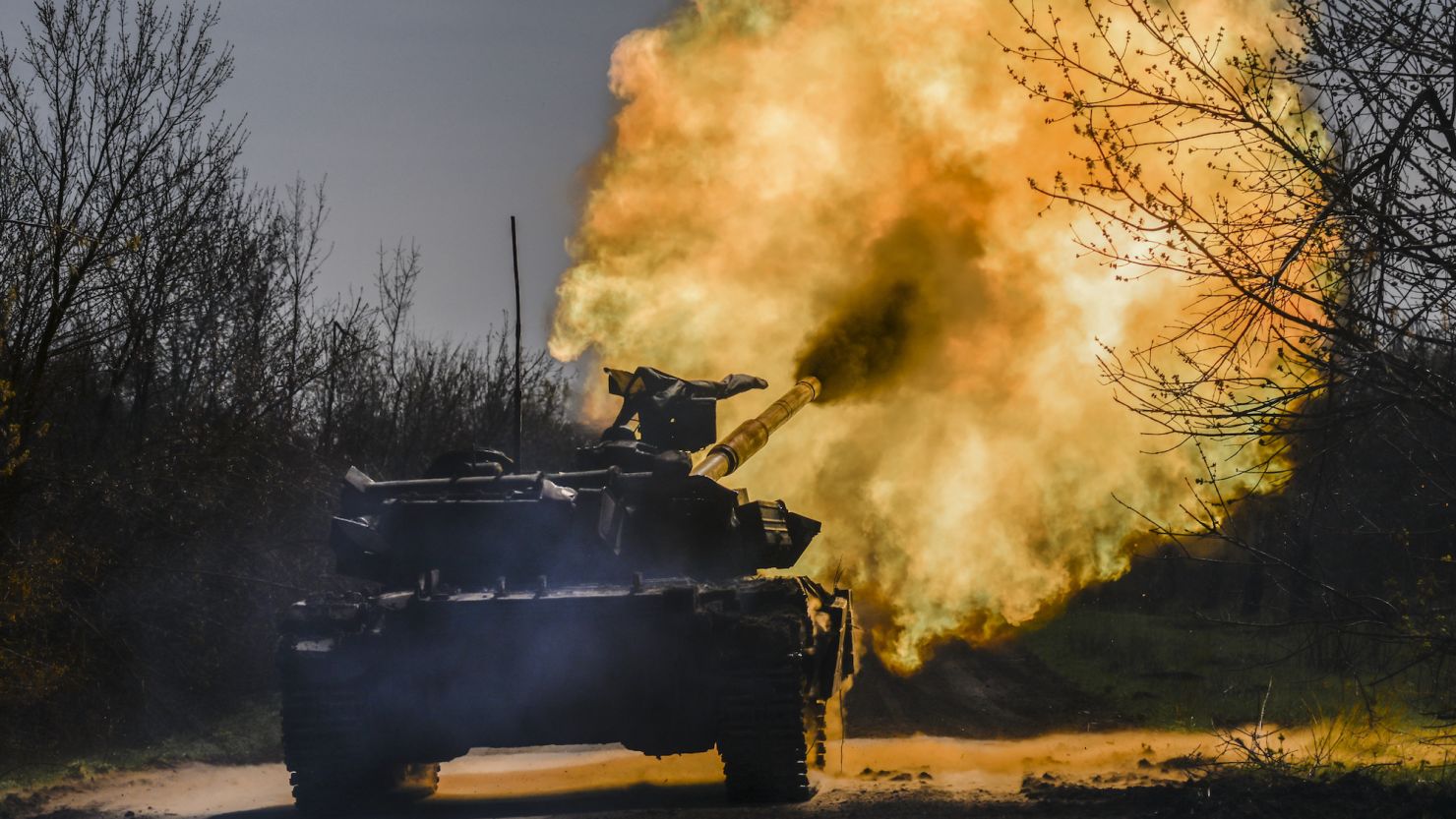 A Ukrainian tank opens fire on targets to support infantry units on the front lines in Avdiivka, in Ukraine's eastern Donetsk region, on April 17, 2023. 