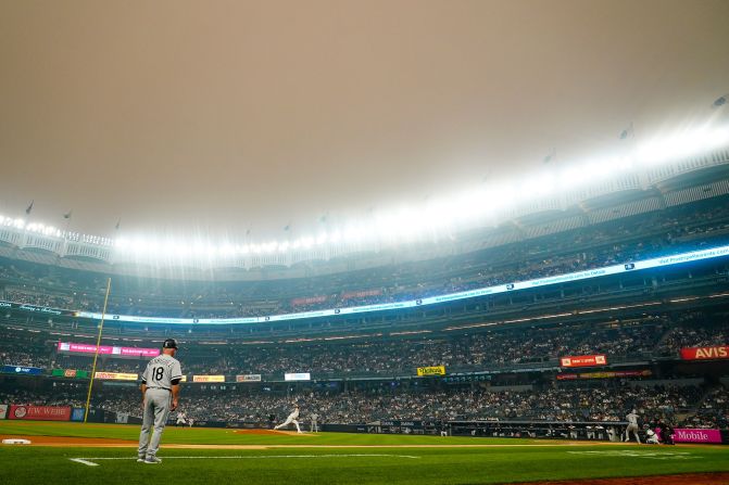 The sky is discolored during a New York Yankees baseball game on June 6.