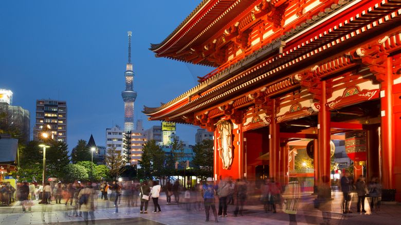 Sky tree tower with Asakusa buddhist temple in foreground evening.