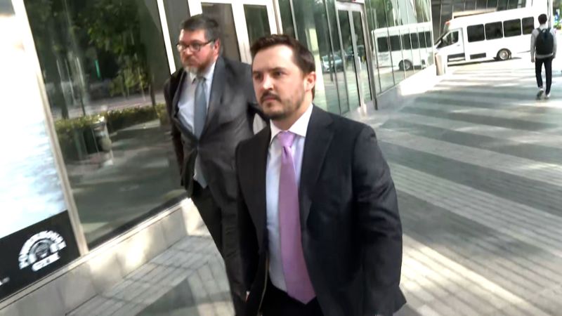 NextImg:Former Trump aide arrives at Miami courthouse to appear before grand jury in classified documents probe | CNN Politics