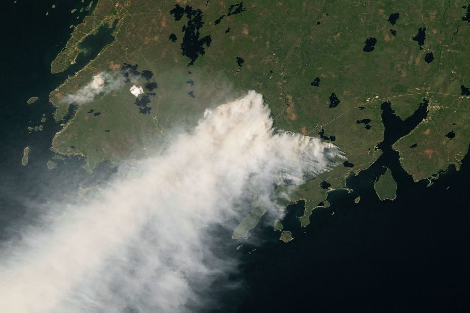 An astronaut aboard the International Space Station took this photo of wildfire smoke near Shelburne, Nova Scotia, on May 29. Human-caused climate change has exacerbated the hot and dry conditions that allow wildfires to ignite and grow.