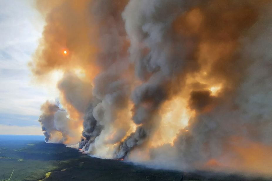 Smoke rises from a wildfire in Fort Nelson on May 27.