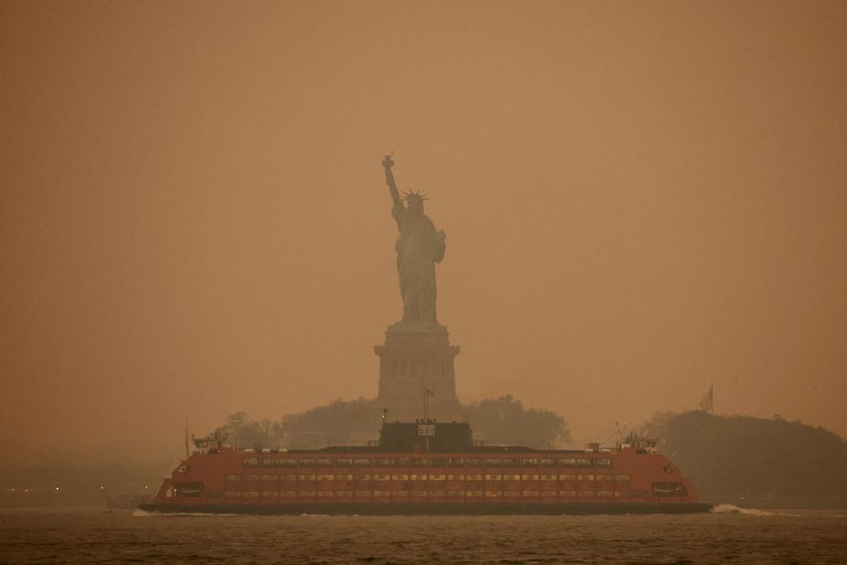 The Statue of Liberty is obscured by the air pollution in New York on June 6.