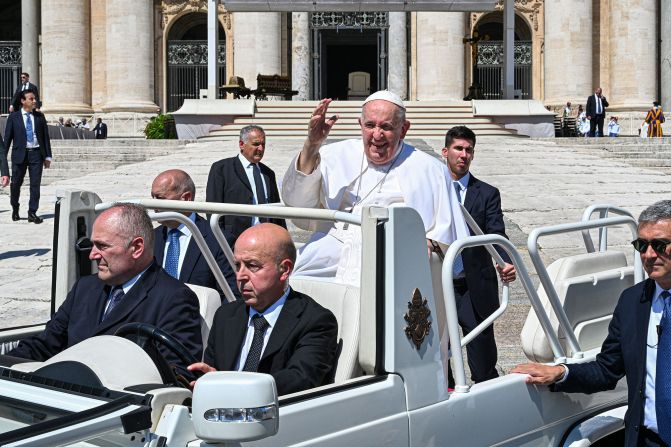 The Pope waves to people in St. Peter's Square in June 2023. <a href="index.php?page=&url=https%3A%2F%2Fwww.cnn.com%2F2023%2F06%2F07%2Feurope%2Fpope-hospital-surgery-intl%2Findex.html" target="_blank">He was on his way to a Rome hospital for abdominal surgery</a>. The procedure was to repair a hernia that the Vatican said was causing "recurrent, painful and worsening" symptoms.