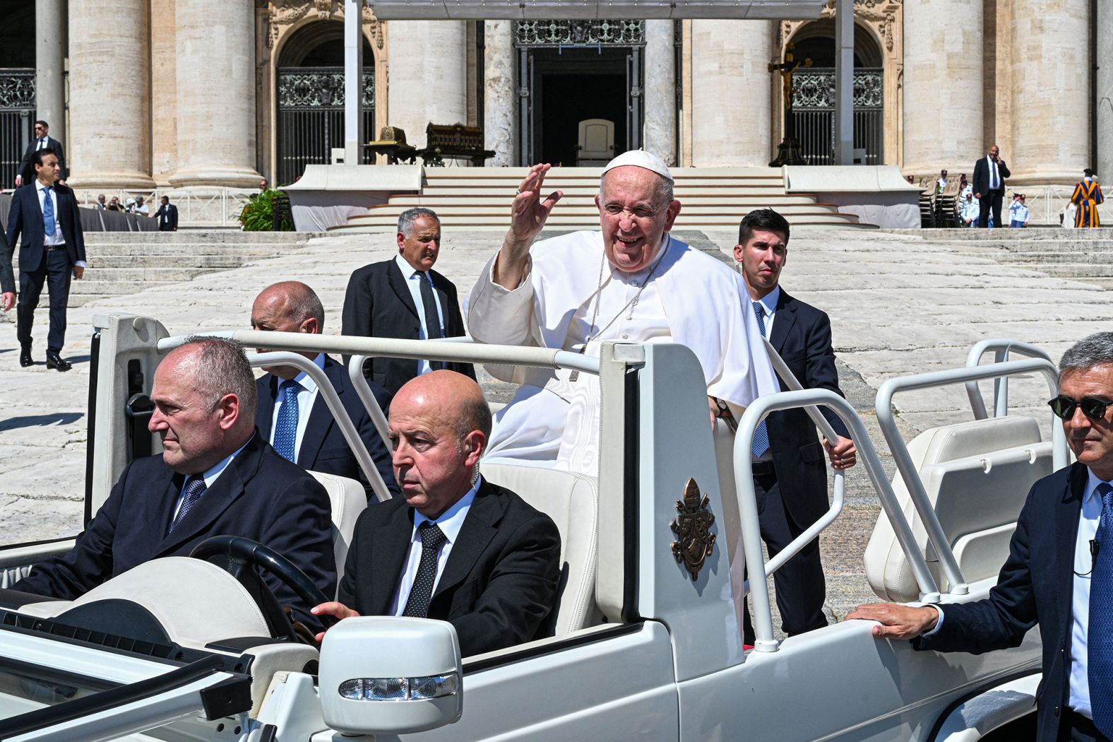 The Pope waves to people in St. Peter's Square in June 2023. <a  target="_blank">He was on his way to a Rome hospital for abdominal surgery</a>. The procedure was to repair a hernia that the Vatican said was causing "recurrent, painful and worsening" symptoms.