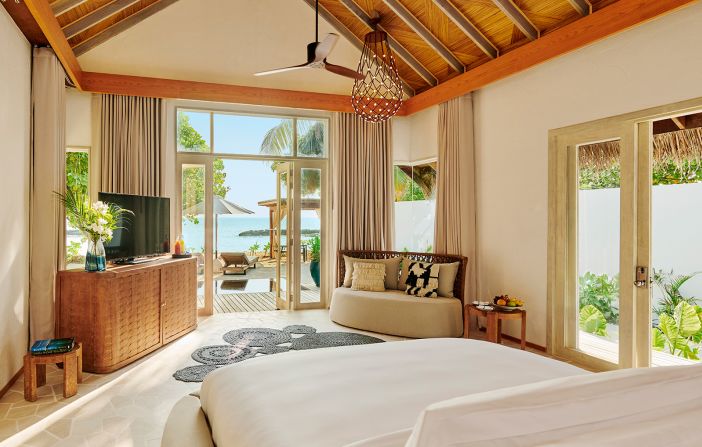 <strong>Multiple villa options: </strong>Guests can choose from a variety of villas, both overwater or on the beach, as well as several new luxury tents. Pictured is the bedroom of a sunrise villa.