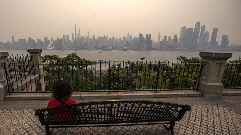 NextImg:FAA lifts ground stop at NYC airport but delays flights due to smoke | CNN Business
