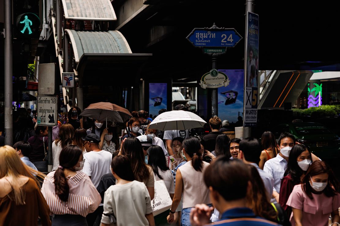 Pedestrians use umbrellas to shield themselves from the sun in Bangkok, Thailand, on April 25.