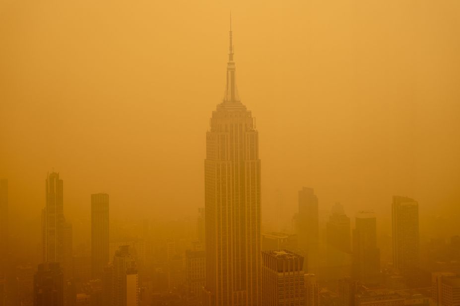 Smoky haze affects the visibility of the Empire State Building in New York on June 7.