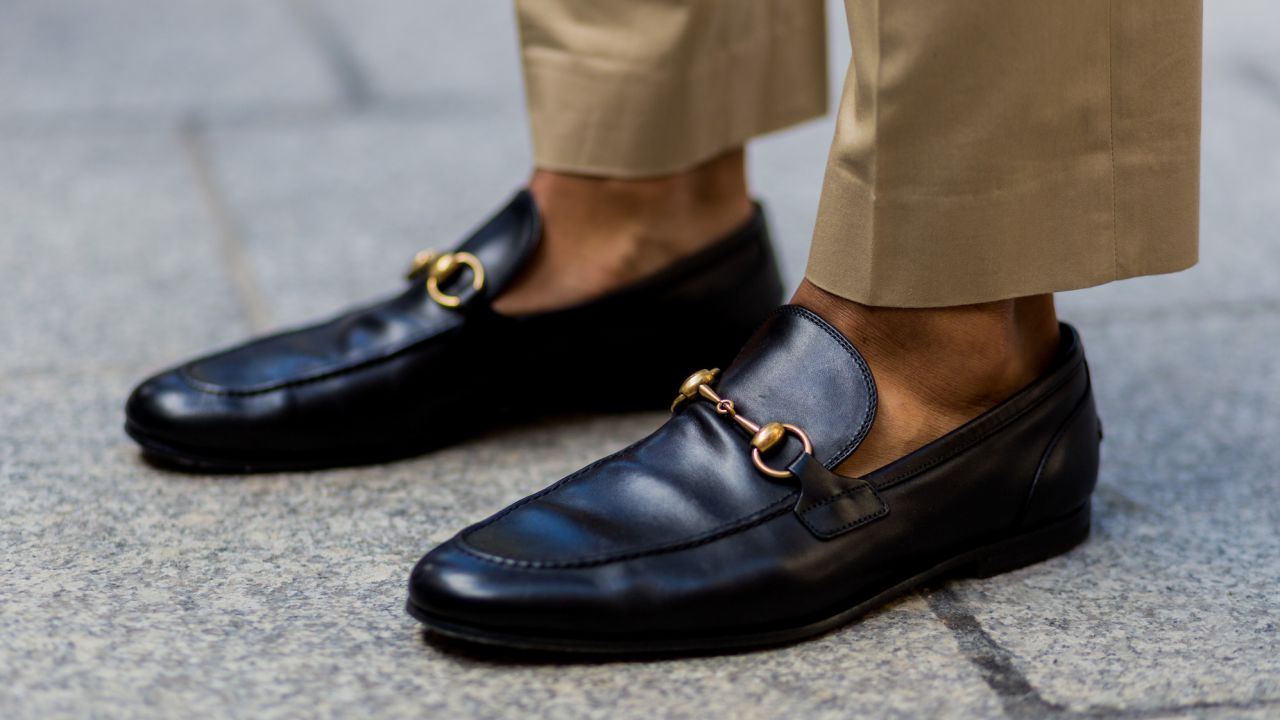 PARIS, FRANCE -- JUNE 23: A guest wearing black Gucci loafer outside Louis Vuitton during the Paris Fashion Week Menswear Spring/Summer 2017 on June 23, 2016 in Paris, France.  (Photo by Christian Vierig/Getty Images) *** Local Caption ***