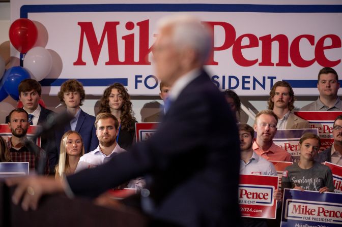 People watch as Pence <a href="index.php?page=&url=https%3A%2F%2Fwww.cnn.com%2F2023%2F06%2F07%2Fpolitics%2Fpence-2024-presidential-campaign%2Findex.html" target="_blank">announces his presidential candidacy</a> in Ankeny, Iowa, in June 2023. "The American people deserve to know, on (January 6, 2021), President Trump also demanded I choose between him and the Constitution. Now voters will be faced with the same choice. I chose the Constitution, and I always will," Pence said to applause from the crowd at Des Moines Area Community College.